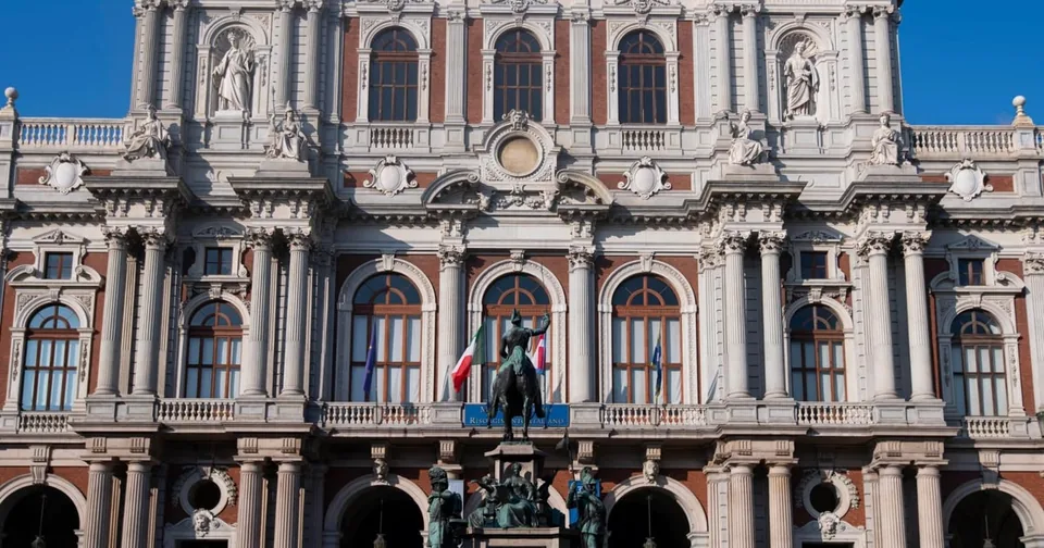 The Baroque brick facade of Palazzo Carignano, opposite the Museo Egizio